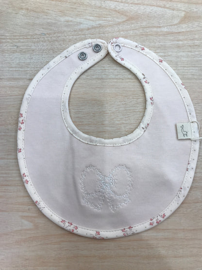 Bavetta Baby Gi rosa antico rotonda con fiocco centrale e dettagli floreali