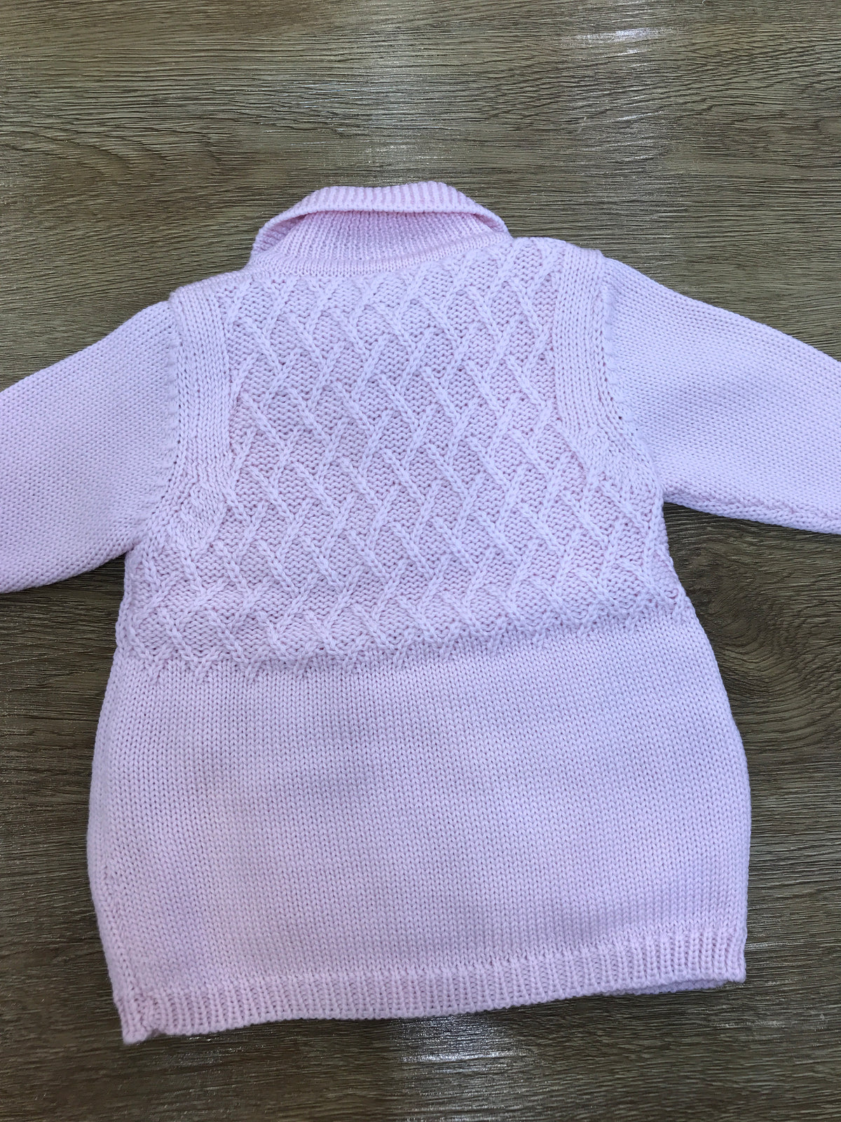 Cappotto Bebè di Almy in lana doppiopetto con lavorazione di punto smock sul davanti