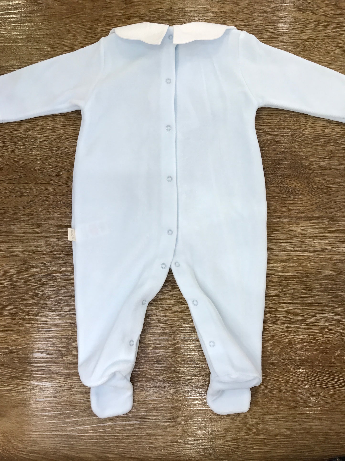 Tutina Baby Gi in ciniglia celeste intera con collo tondo smerlato