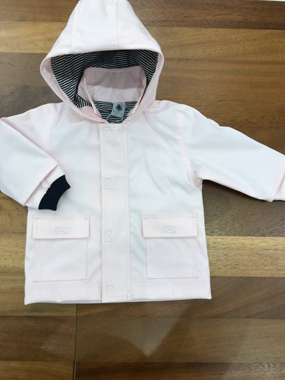 Giubbotto Impermeabile Petit Bateau rosa con cappuccio con zip e strappo e tasche sul davanti