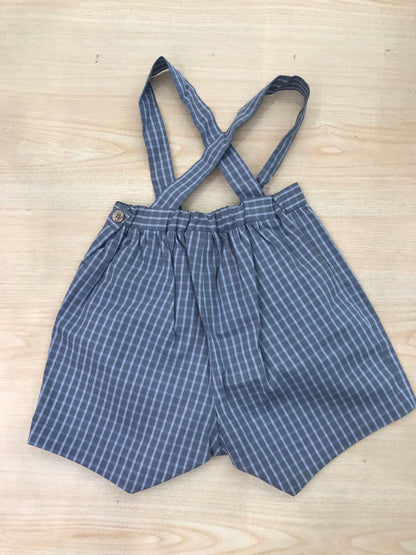 Pantalone Bonpoint in cotone a sbuffo con bretelle fantasia a quadretti