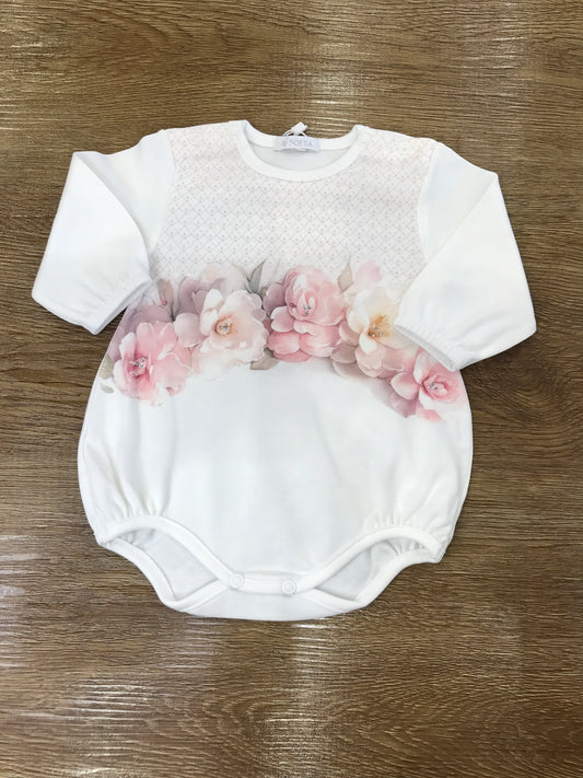Pagliaccetto Sofija in caldo cotone manica lunga con fiori in rosa sul davanti