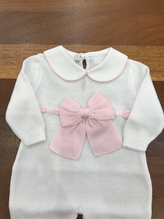 Tutina Baby Lord in filo manica lunga collo tondo bianco rifinito in rosa con fiocco applicato sul davanti in rosa