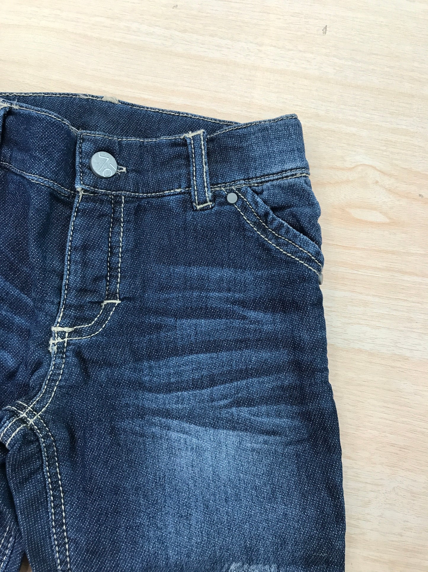 Pantalone Maperò in jeans blu scuro con tasche sul davanti e sul retro