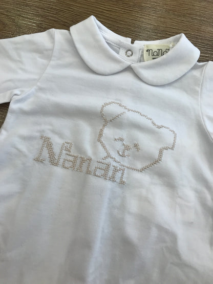 Tutina Nanan in cotone intera bianca con orsetto ricamato sul davanti