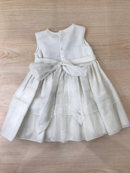 Abito Colibrì in cotone con corpetto in filo bianco con applicazione id fiori bianchi e rosa con fiocco sul retro