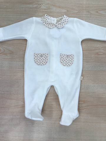 Tutina Baby Gi in ciniglia intera con taschine e fiocchetto floreale sul davanti
