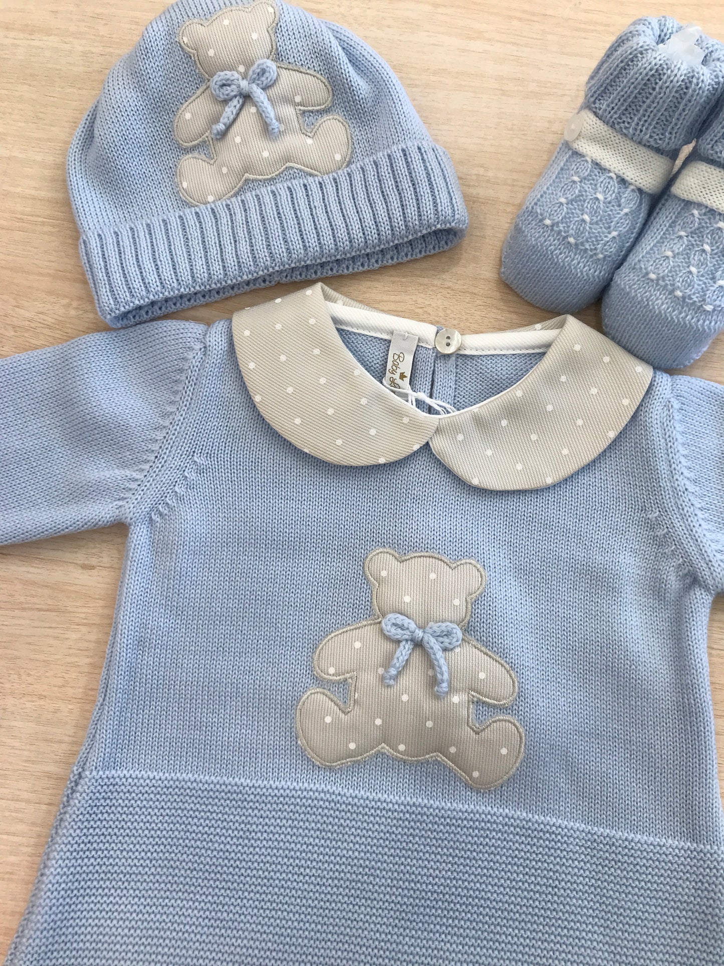 Tutina Baby Lord in lana celeste intera con colletto tortora e pois bianchi ed orsetto centrale