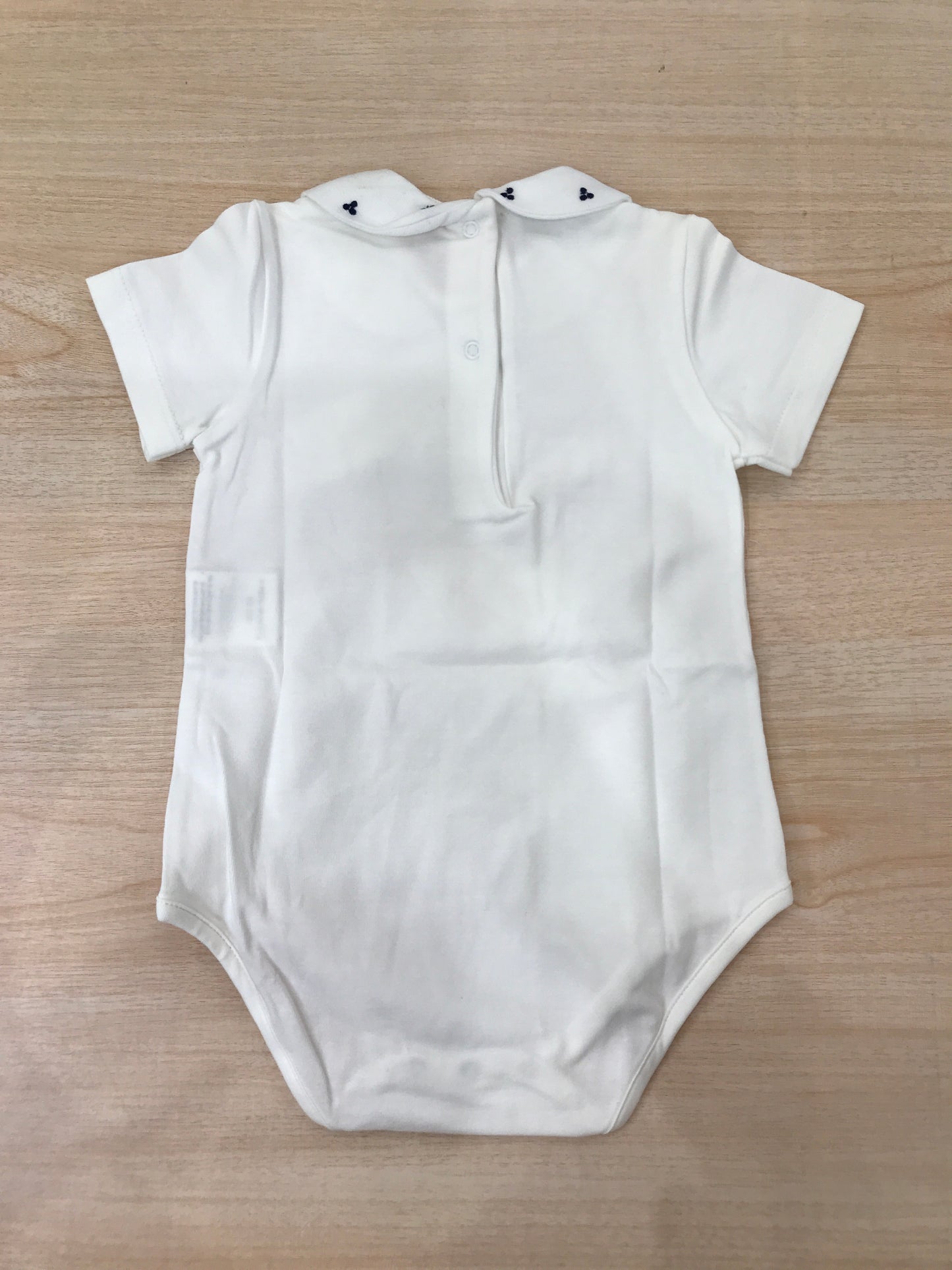 Body Jo Milano mezza manica in cotone con collo tondo con ricami blu