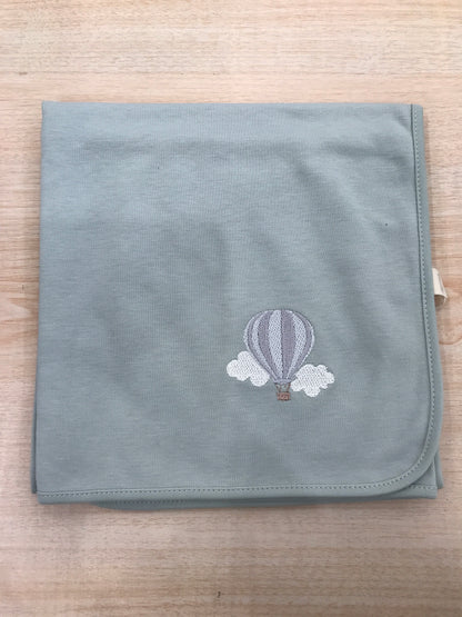 Mussola Baby Gi in cotone verde menta con mongolfiera
