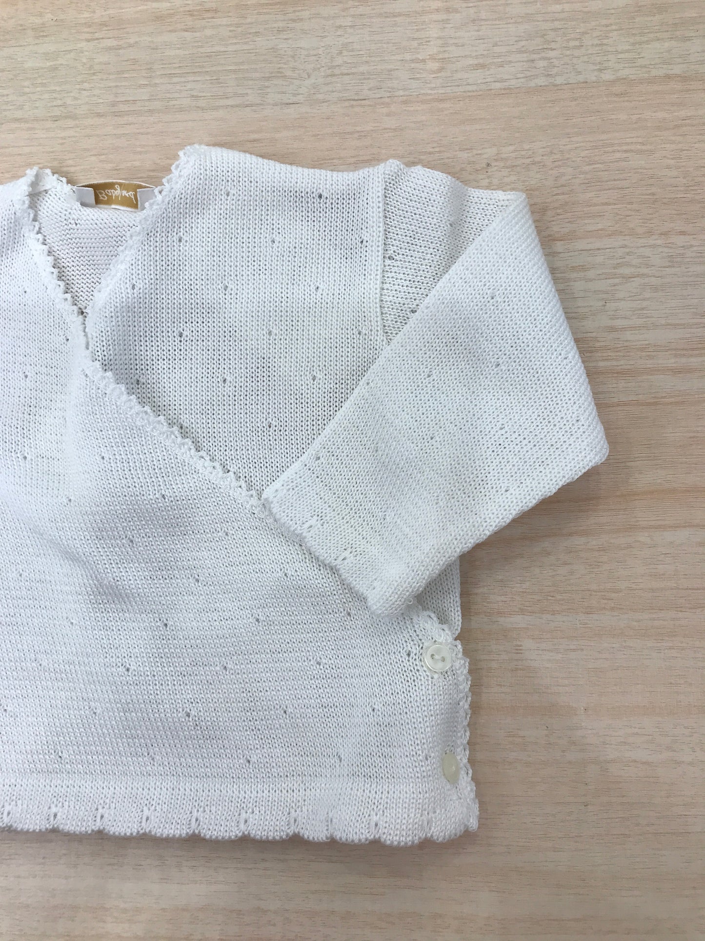 Cardigan Baby Lord in filo bianco traforato ad incrocio