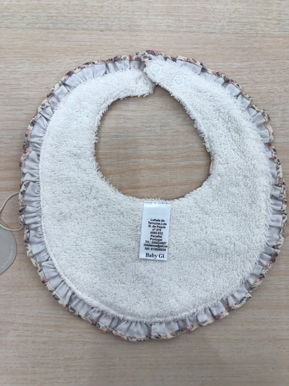 Bavetta Baby Gi in cotone floreale smerlata con rusche e in spugna sul retro