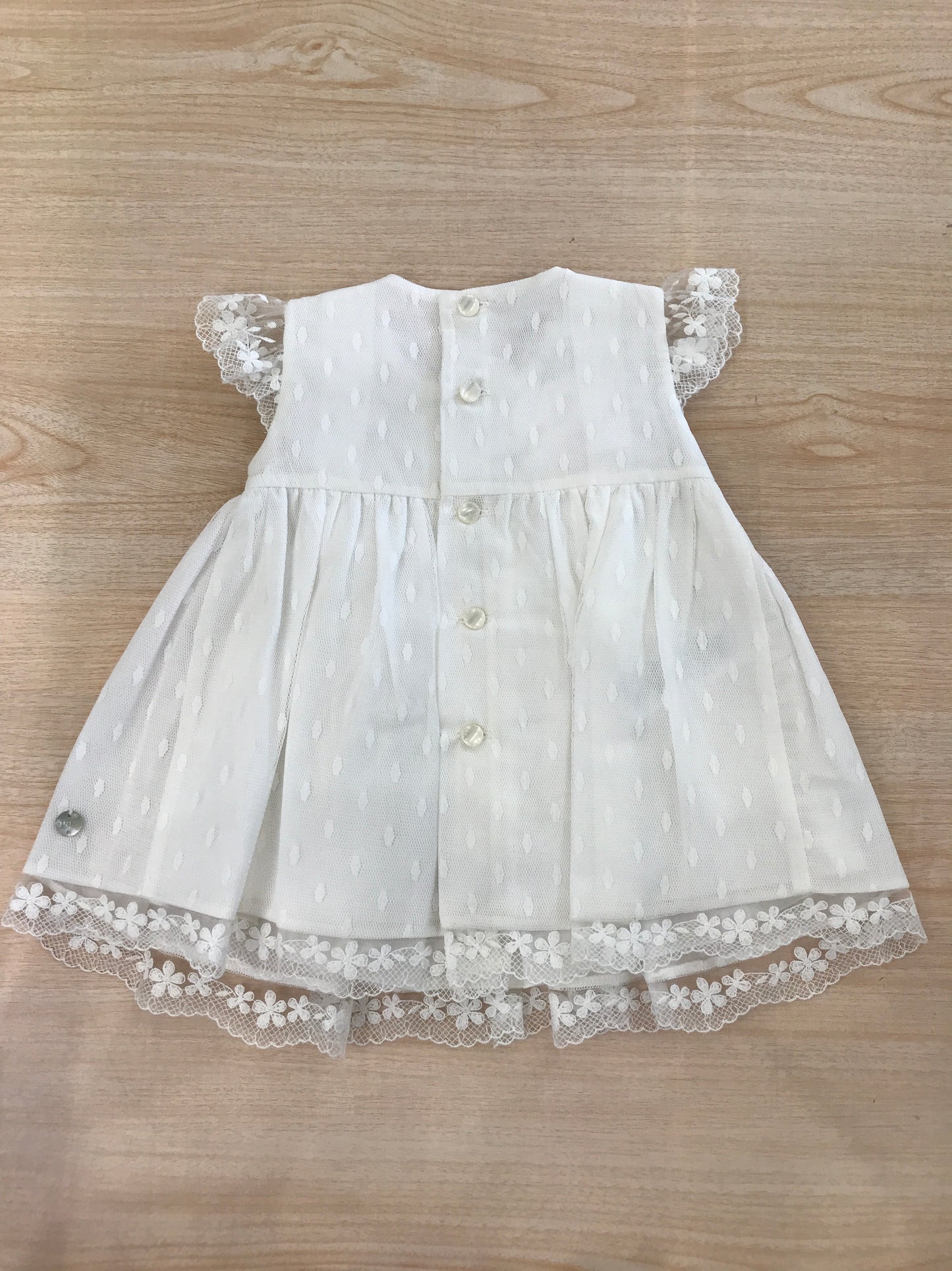Abito Paz Rodriguez in cotone smanicato con rusche con rifinitura in tulle e fiore sul davanti laterale