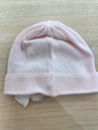 Cappello Baby Lord in filo rosa con risvolto con fiocco bianco