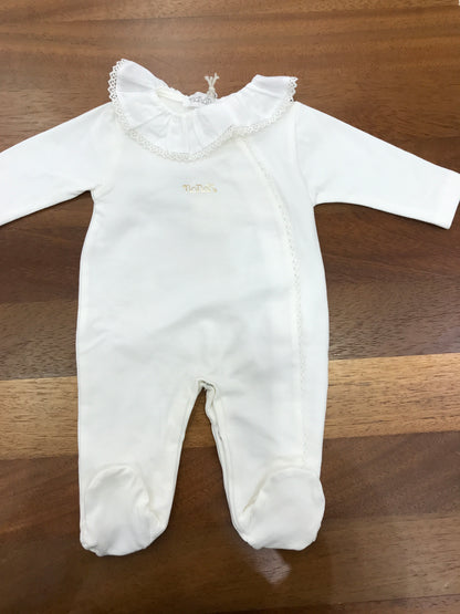 Tutina Nanan in cotone manica lunga con piedini collo con rusche bianca