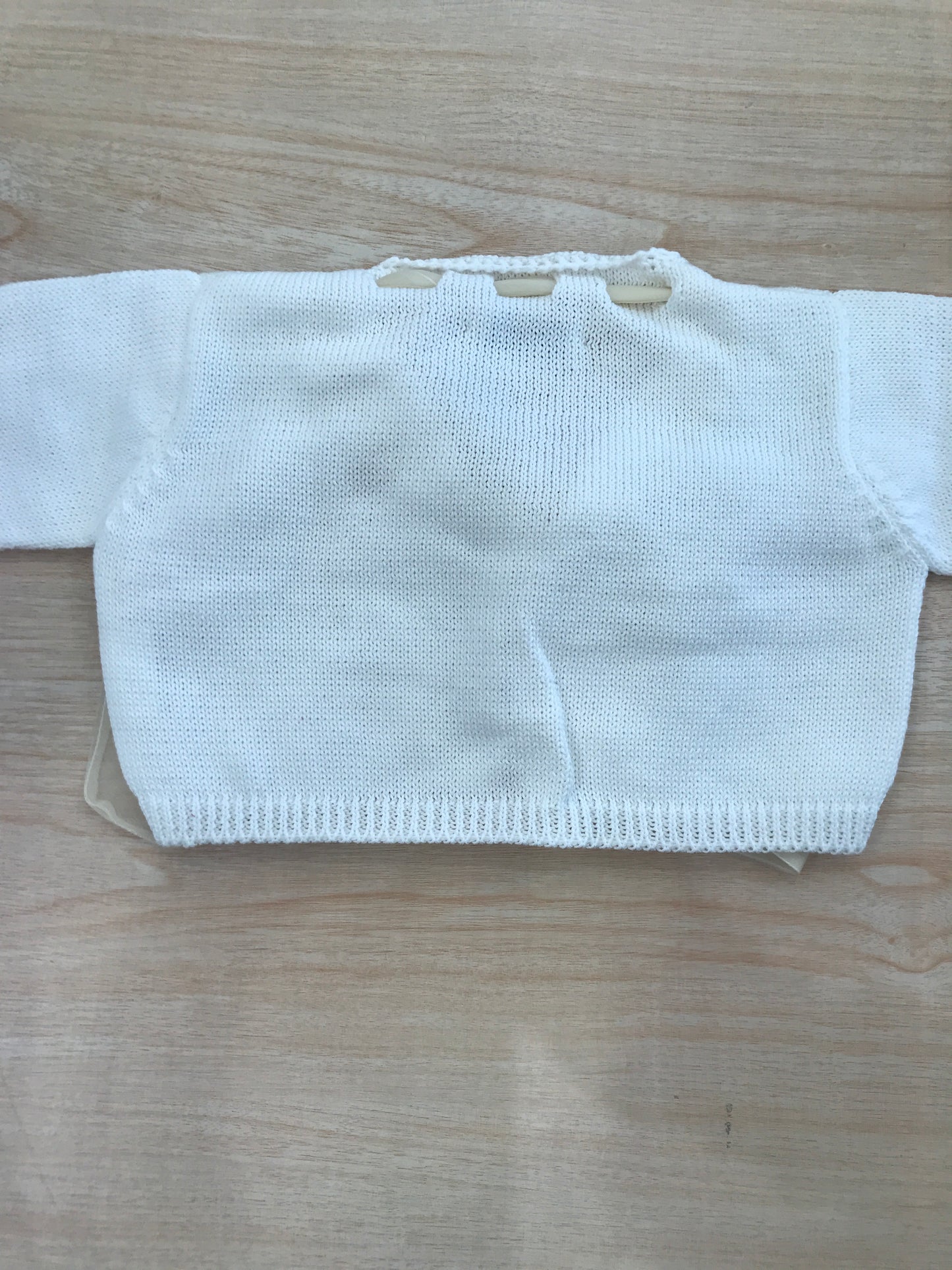 Cardigan Piccola Giuggiola in filo bianco con laccio panna