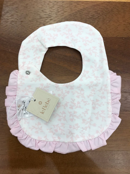 Bavetta Le Bebè in cotone con bordo con rusche rosa di base bianco con fiori rosa