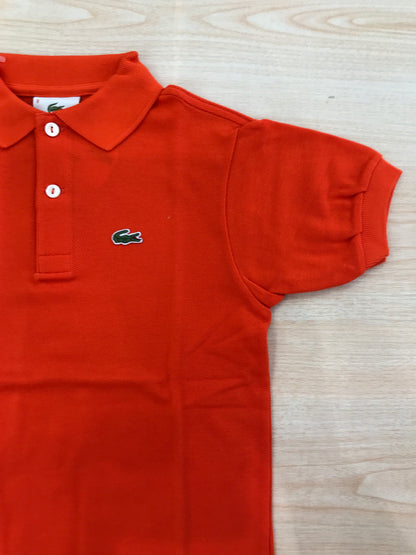Polo Lacoste in cotone mezza manica con bottoncini e logo ricamato lateralmente unisex