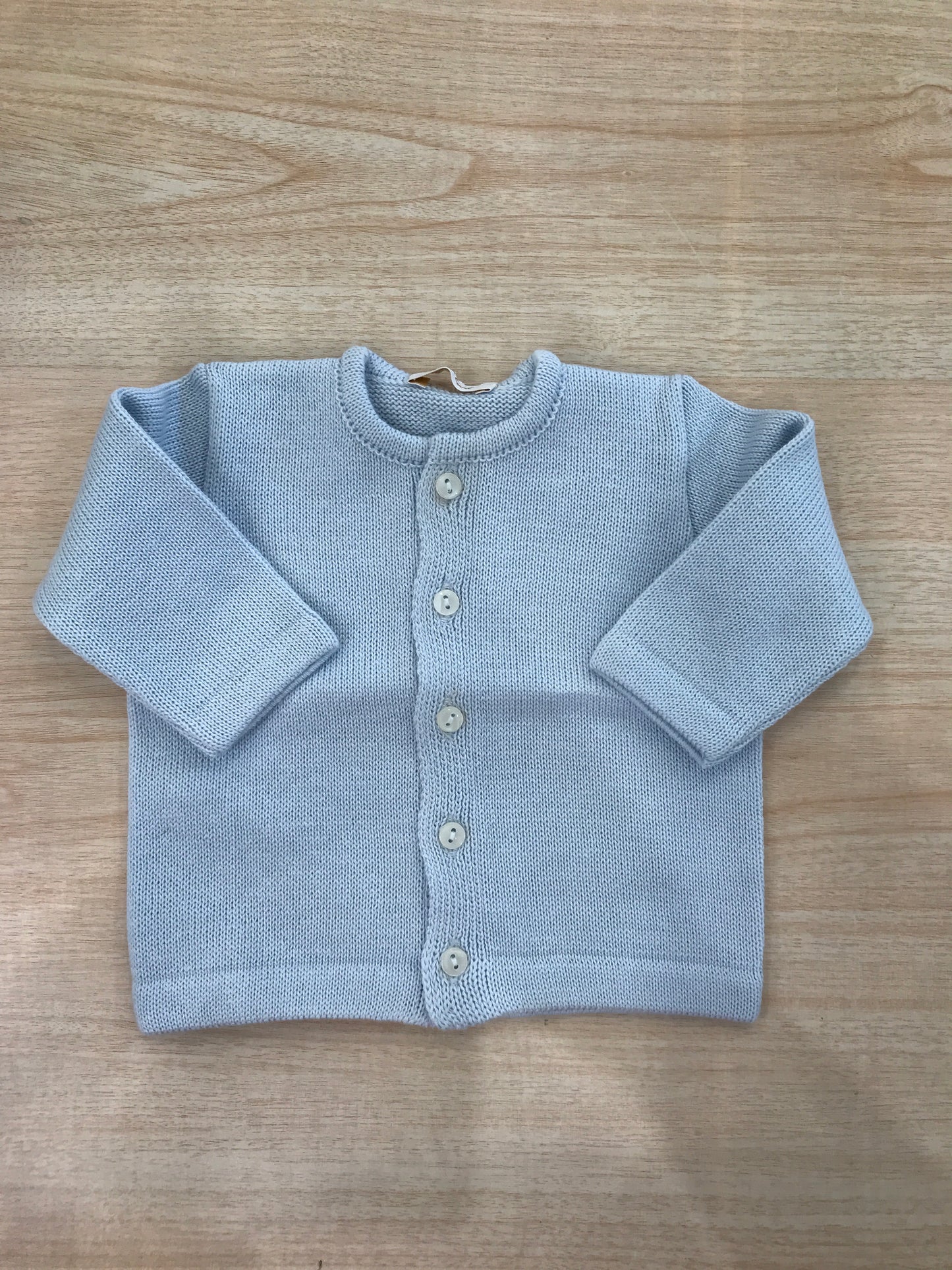 Cardigan Baby Lord in filo celeste con piccoli bottoncini