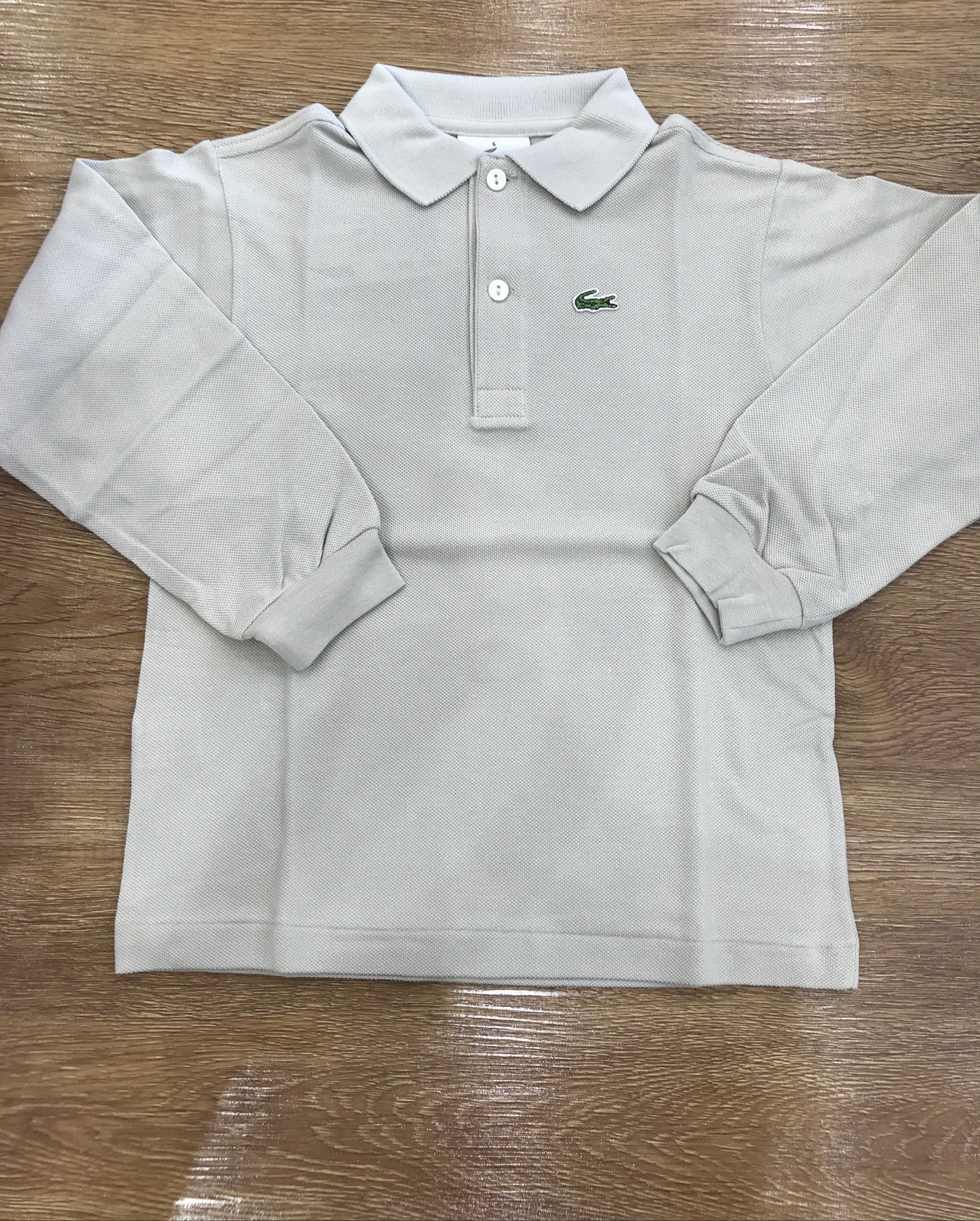 Polo Lacoste manica lunga con polsini e bottoncini