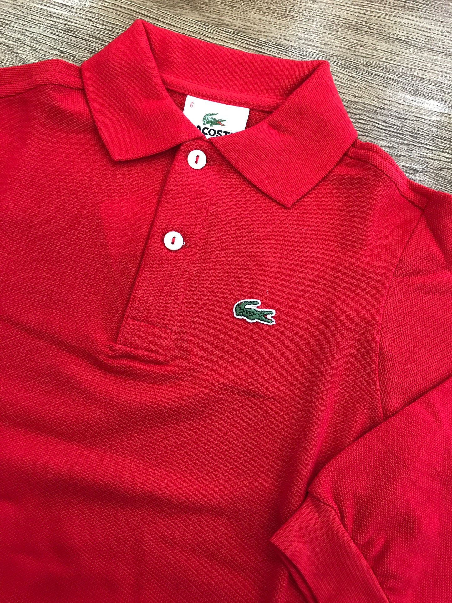 Polo Lacoste manica lunga con polsini e bottoncini