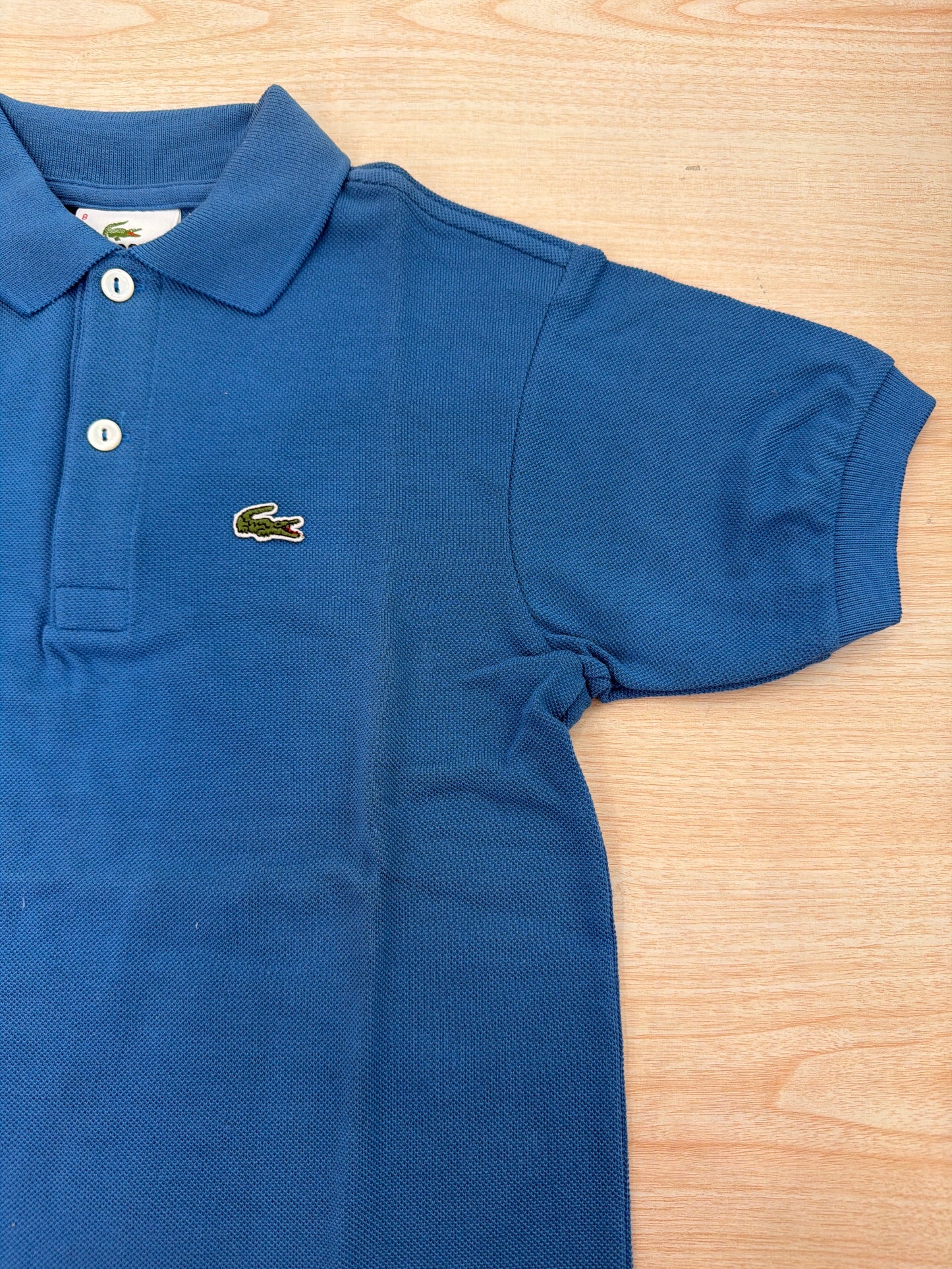 Polo Lacoste in cotone mezza manica con bottoncini e logo ricamato lateralmente unisex
