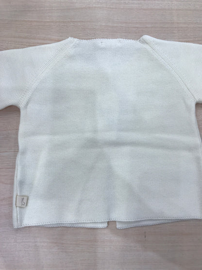 Cardigan Baby Lord in filo panna manica lunga con due piccoli bottoncini sul davanti