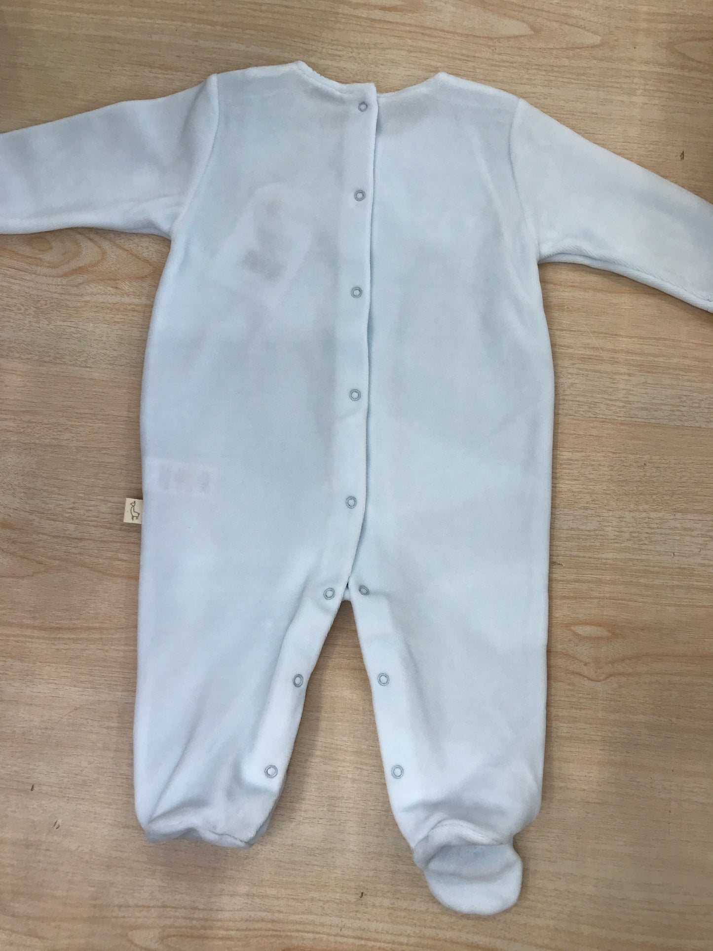 Tutina Baby Gi in ciniglia celeste intera con dettaglio bianco smerlato effetto bavetta