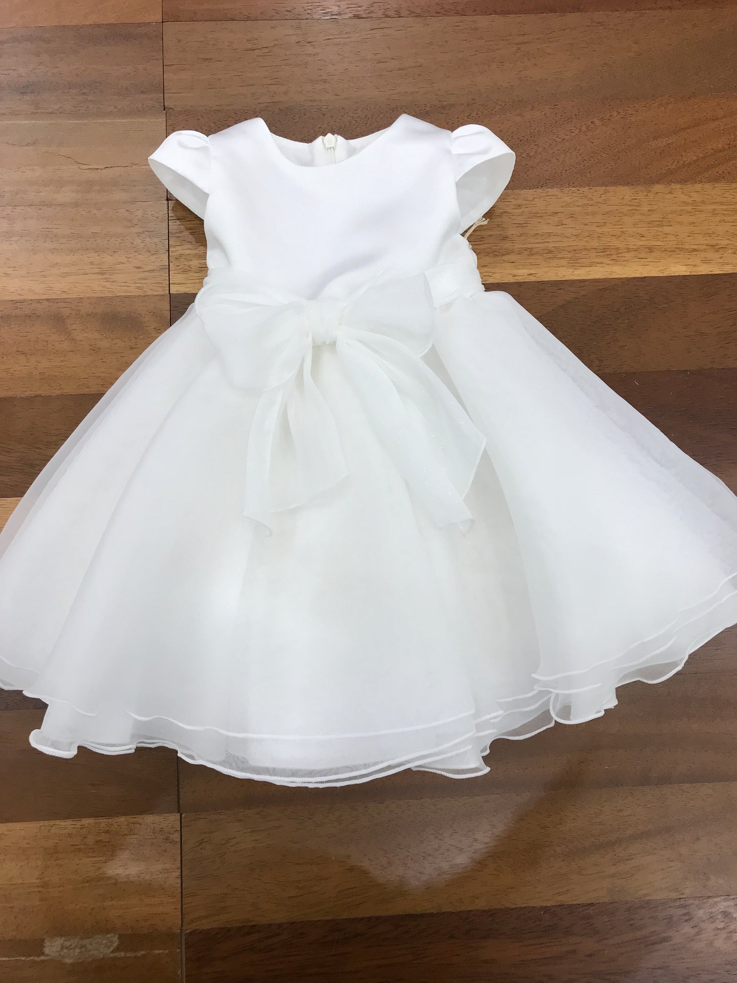 Abito Pure da cerimonia in organza gonna a ruota con fiocco brillantinato sul davanti e retro