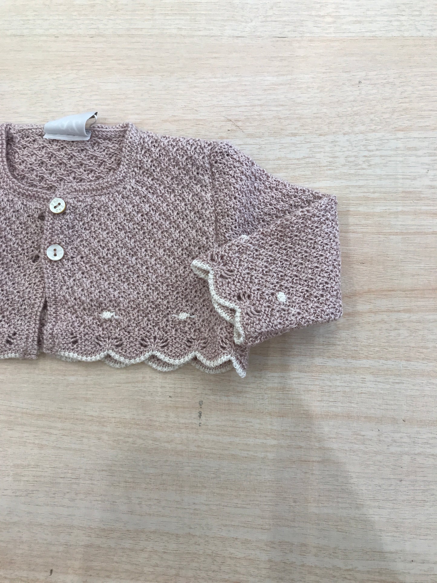 Cardigan Paz Rodriguez in filo rosa antico traforato e rifinito in panna