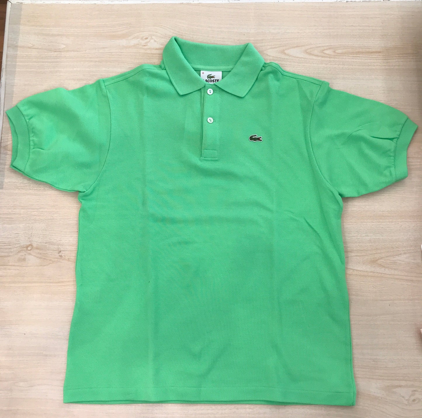 Polo Lacoste in cotone mezza manica con bottoncini e logo ricamato lateralmente unisex