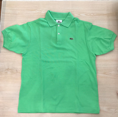 Polo Lacoste in cotone mezza manica con bottoncini e logo ricamato lateralmente unisex