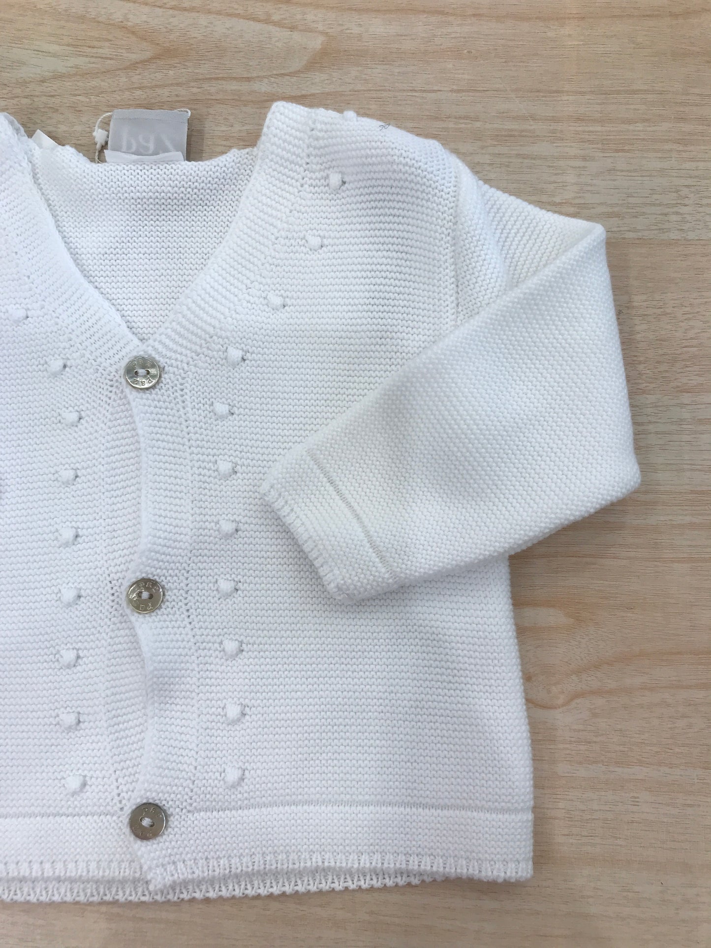 Cardigan Paz Rodriguez in filo bianco con pois in rilievo e piccoli bottoncini
