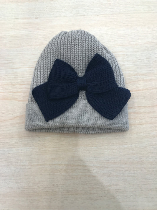 Cappello Baby Lord a costa inglese con risvolto e fiocco applicato al centro