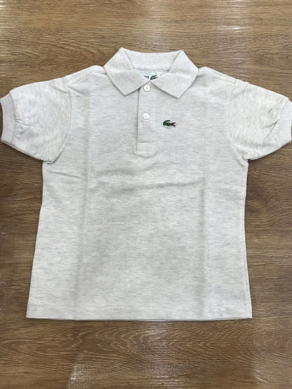 Polo Lacoste mezza manica con polsini e bottoncini
