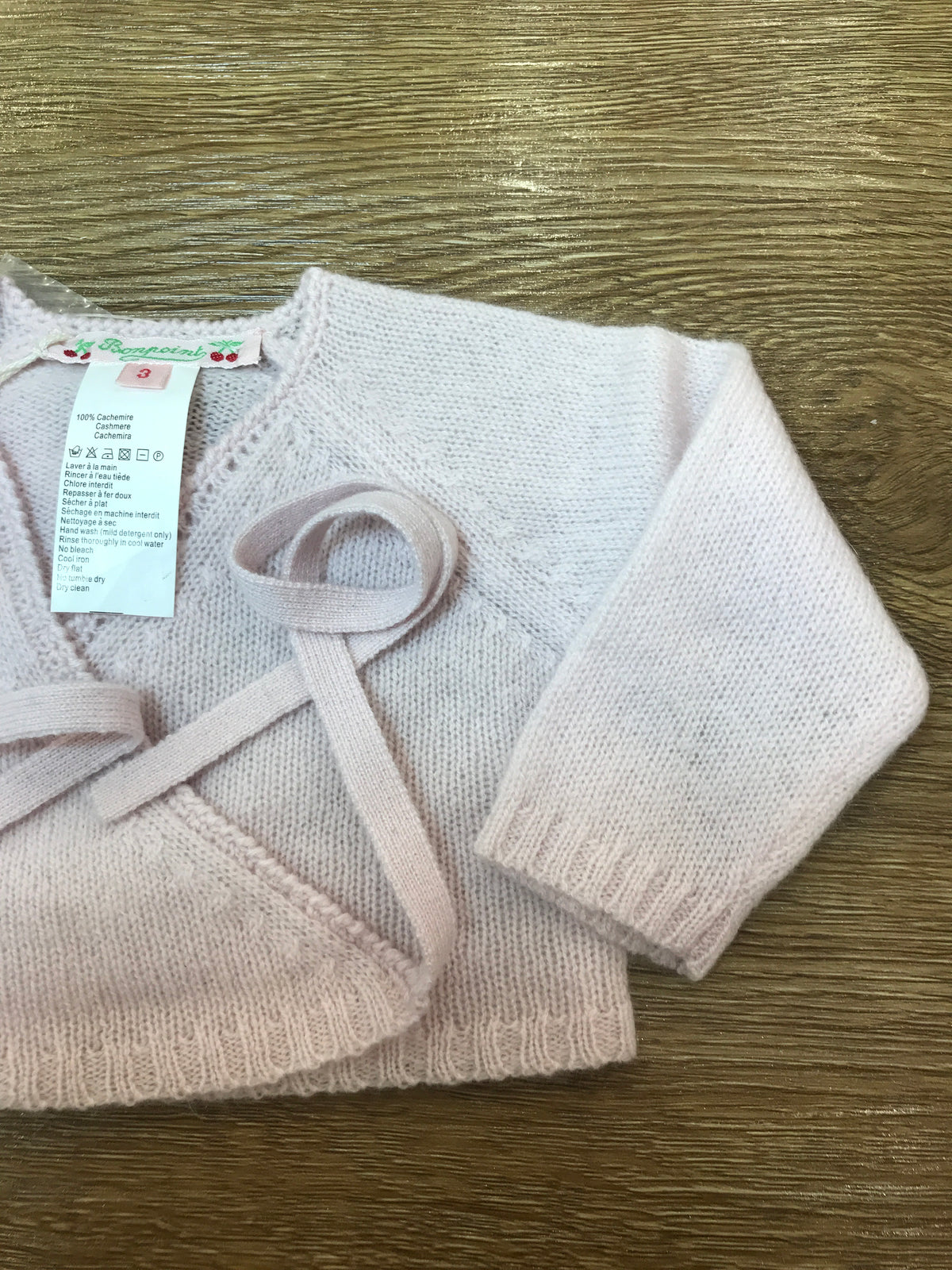 Cardigan Bonpoint in lana ad incrocio con lacci per fiocchetto