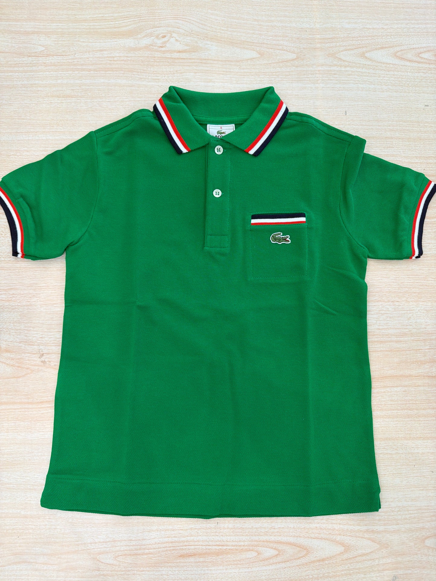 Polo Lacoste in cotone mezza manica con bottoncini e logo ricamato lateralmente unisex