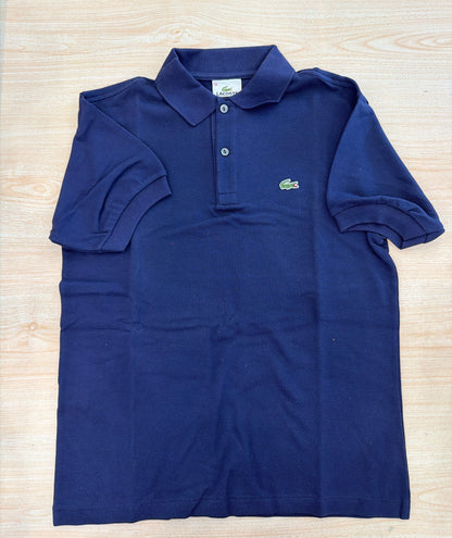 Polo Lacoste in cotone mezza manica con bottoncini e logo ricamato lateralmente unisex