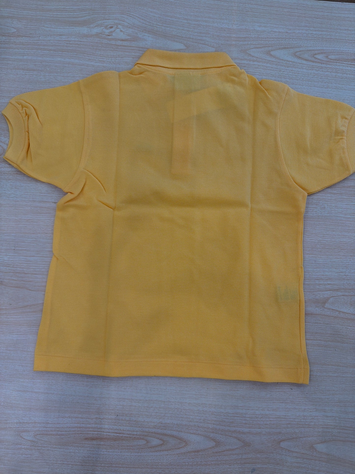 Polo Lacoste in cotone mezza manica con bottoncini e logo ricamato lateralmente unisex