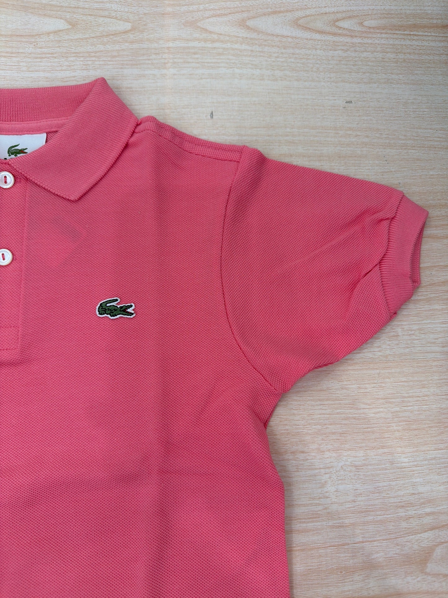 Polo Lacoste in cotone mezza manica con bottoncini e logo ricamato lateralmente unisex