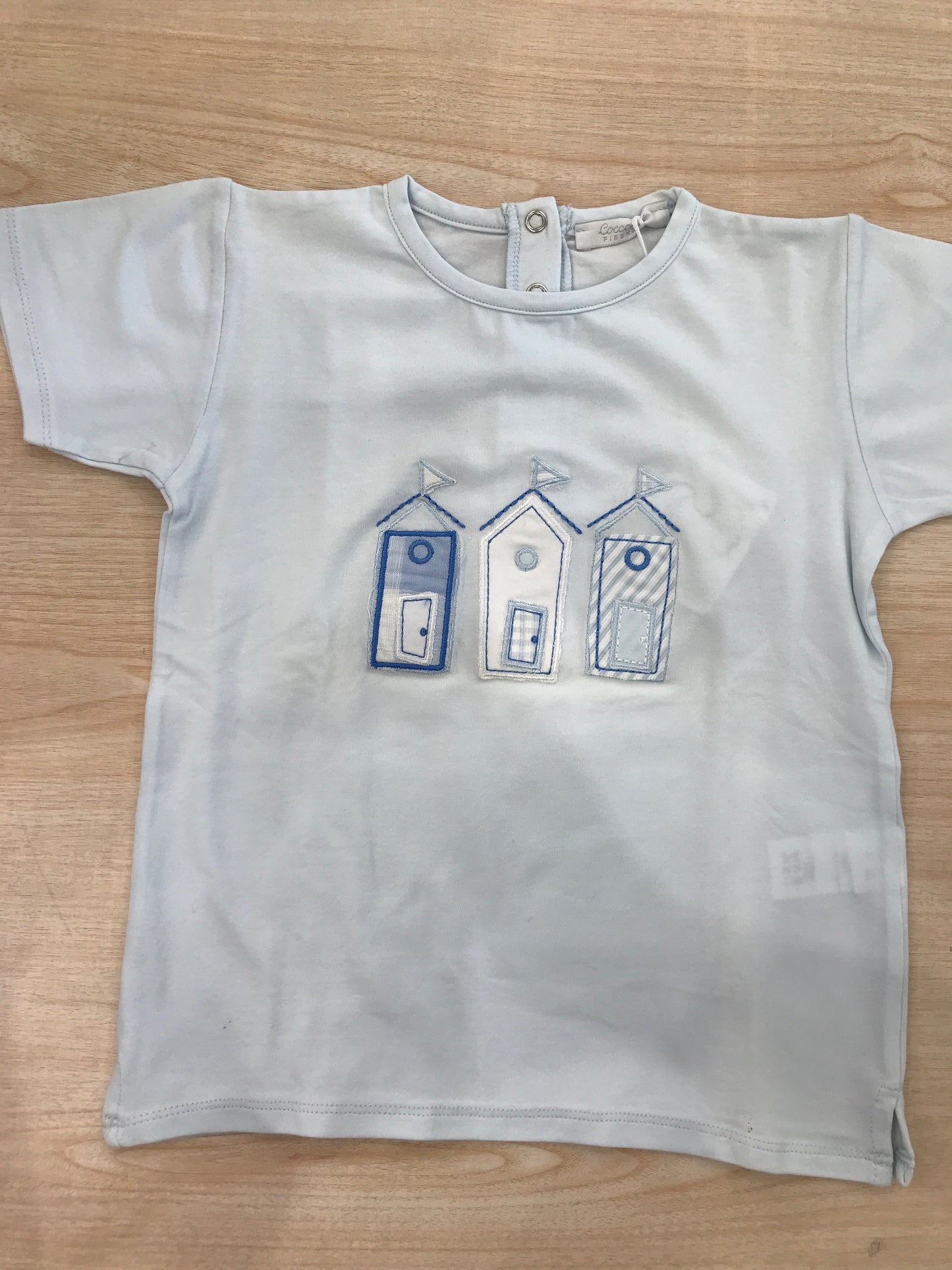 T-shirt Coccodèin cotone mezza manica celeste con disegni sul davanti