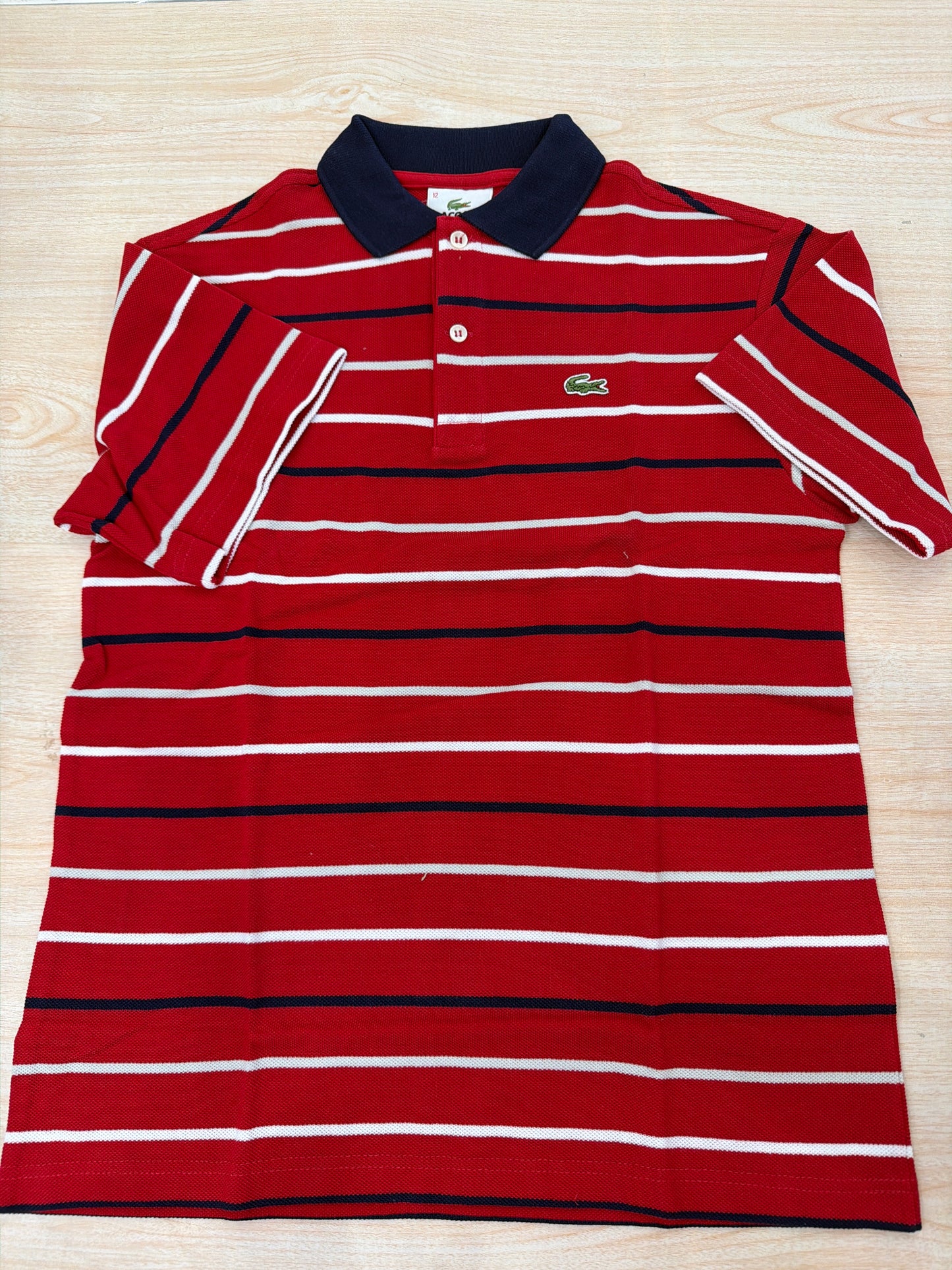 Polo Lacoste in cotone mezza manica con bottoncini e logo ricamato lateralmente unisex