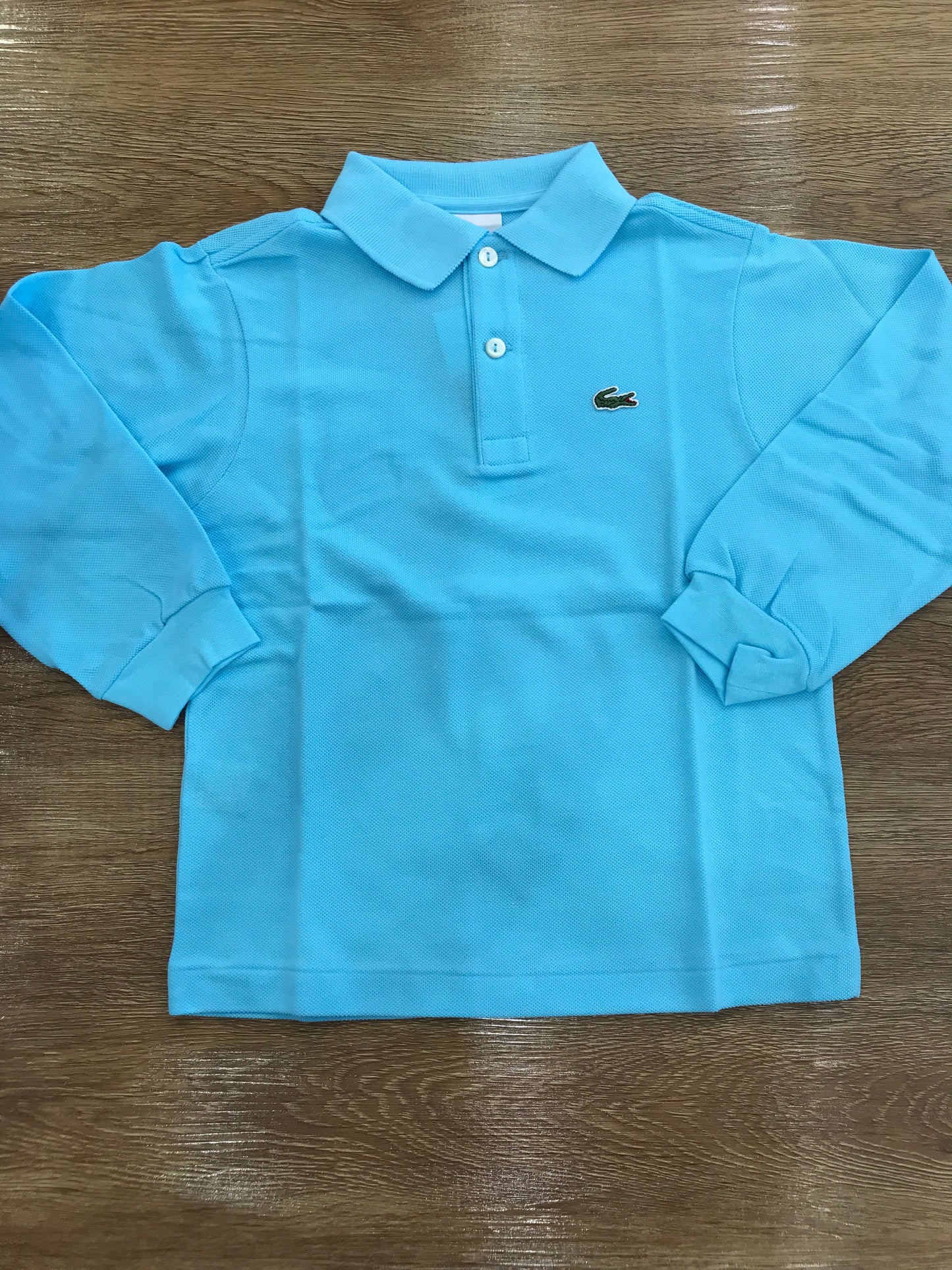 Polo Lacoste manica lunga con polsini e bottoncini