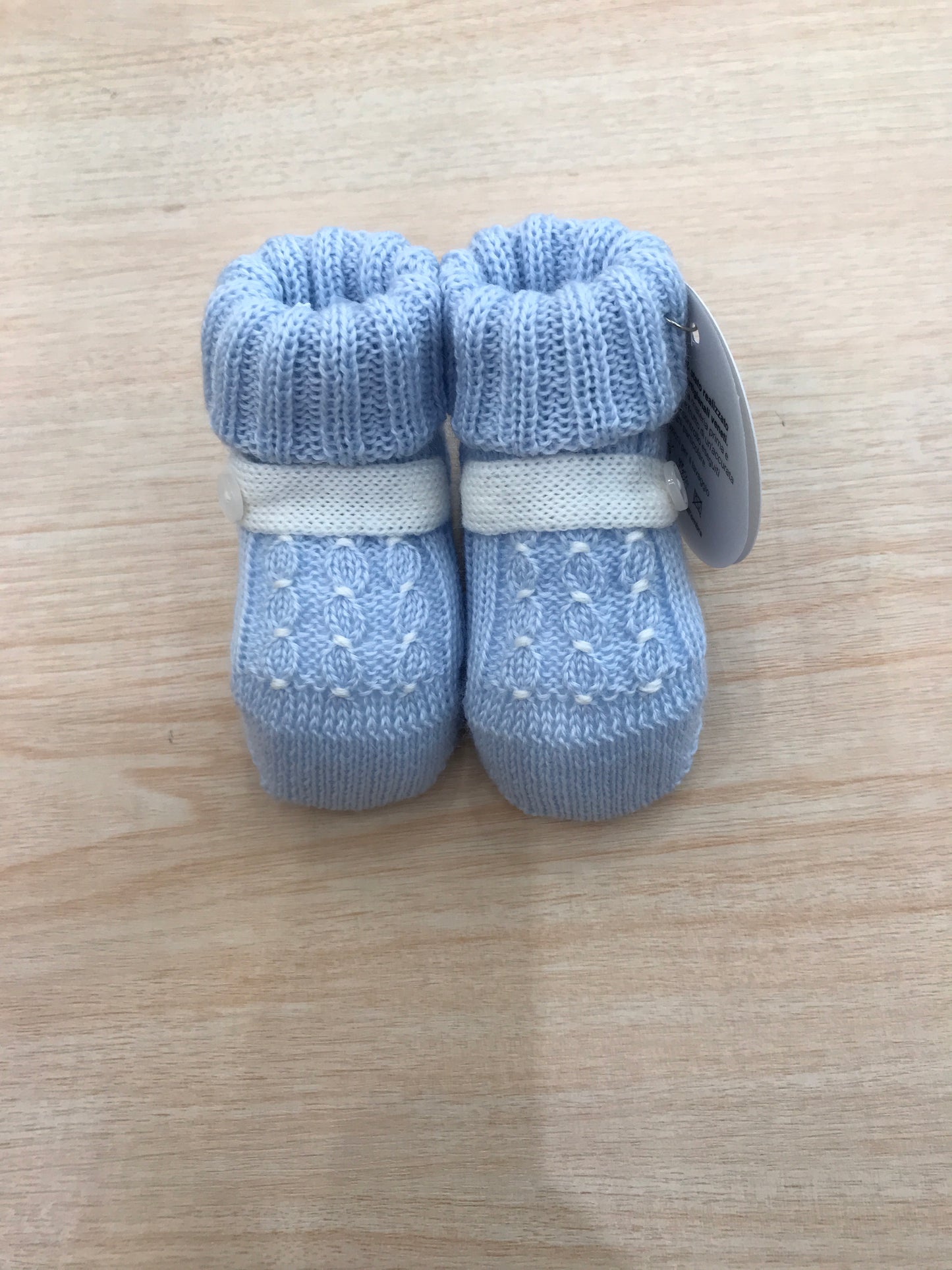 Babbucce Baby Lord in lana celeste con lavorazione di punto smock panna