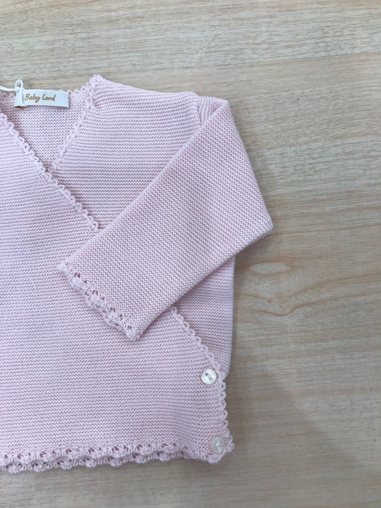 Cardigan Baby Lord in filo rosa ad incrocio
