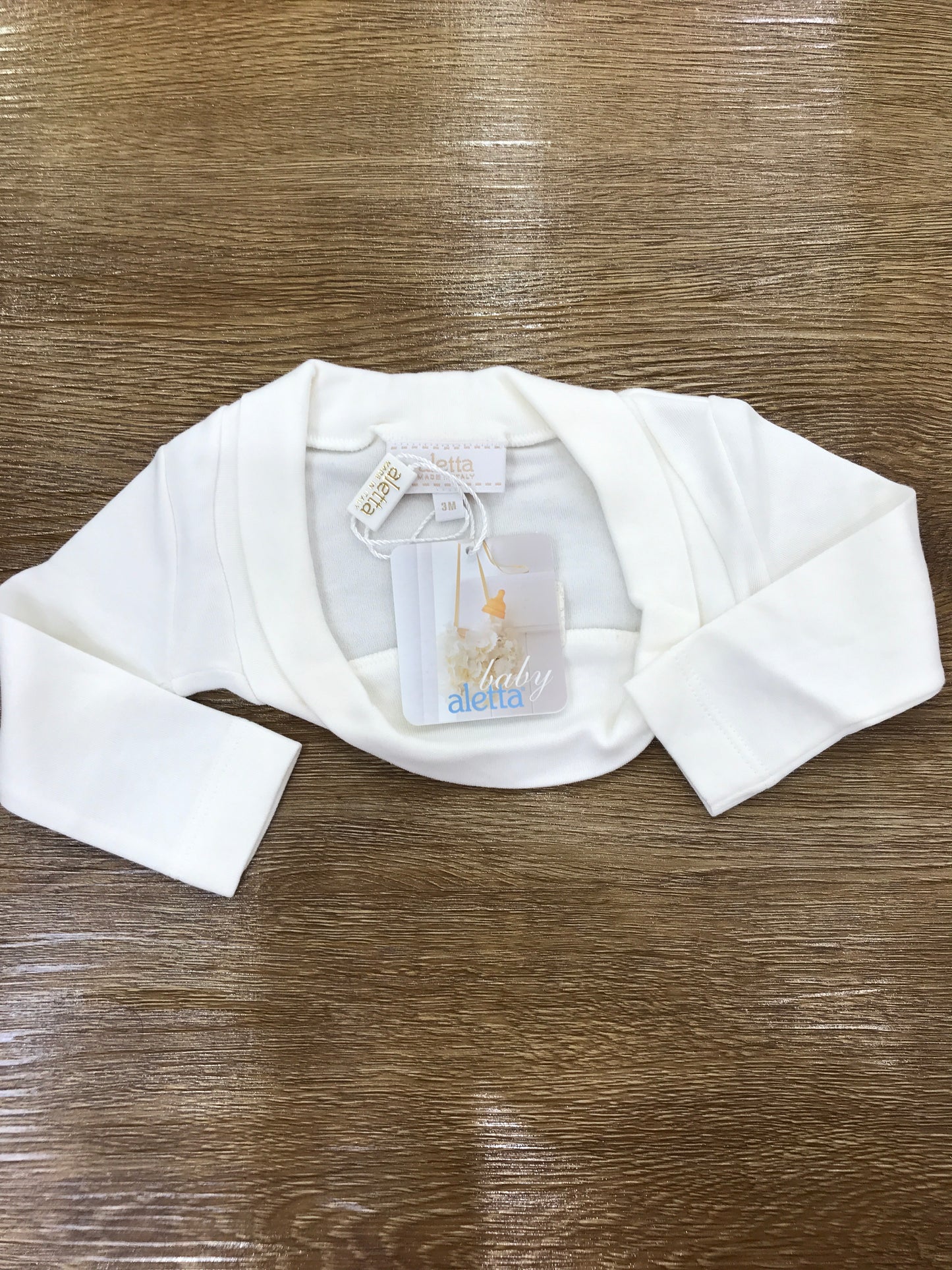 Cardigan Aletta in caldo cotone con fiocchetto sul retro