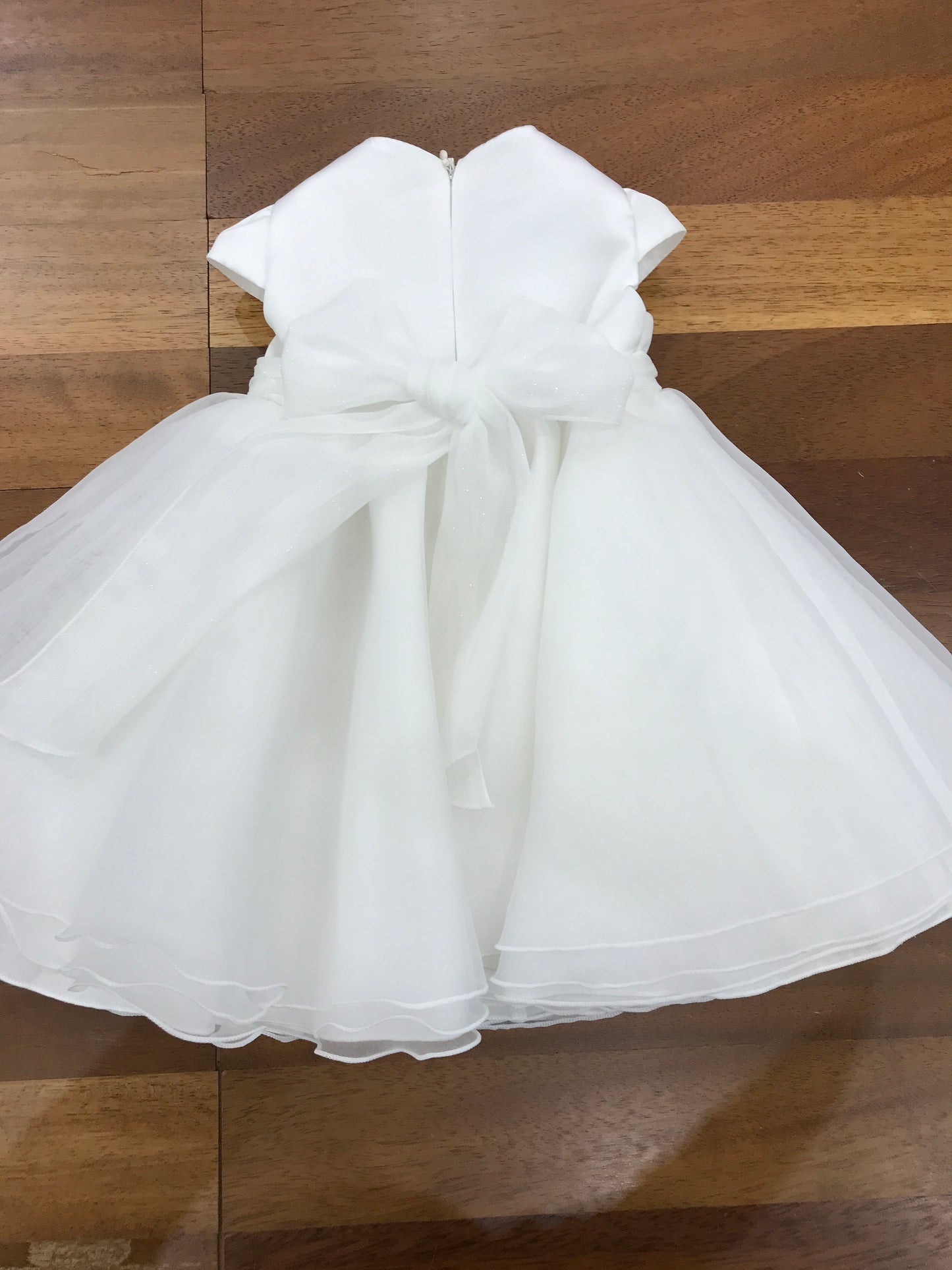 Abito Pure da cerimonia in organza gonna a ruota con fiocco brillantinato sul davanti e retro