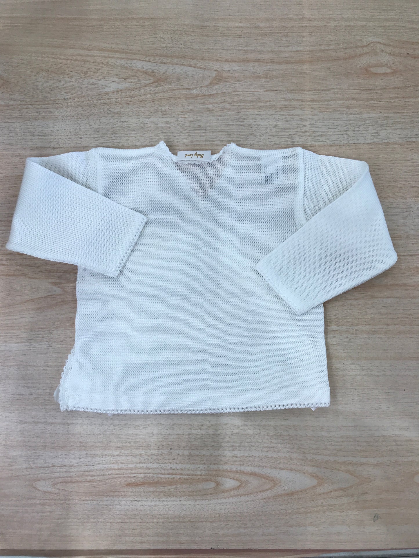 Cardigan Baby Lord in filo bianco ad incrocio con fiocchetti