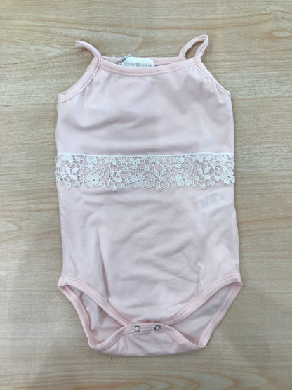 Body Story Loris in cotone rosa con bretelle sottili con ricamo bianco