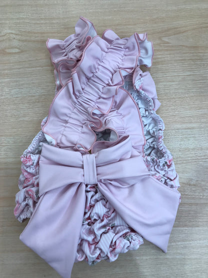 Costume Fofettes con fiorellino rosa e fiocchi sul davanti e sul retro
